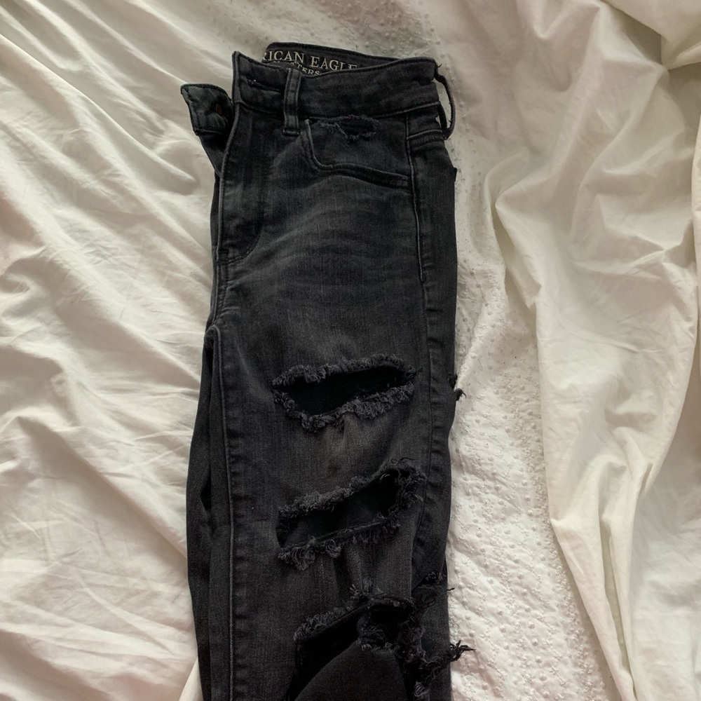 Black super stretch ripped skinny jeans